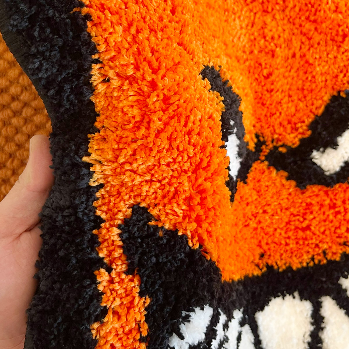 Spitfire Bighead Flame Tufted  - Retro Gaming Rug review and price